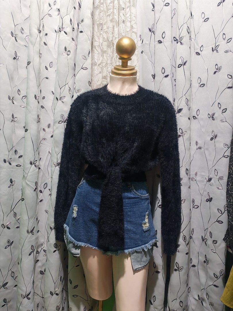 Day & Night Black Fluffy Knit Sweater Size S (Category: Longsleeves) located in Caloocan City. Submitted by _misskaye (Listing ID 1467474316, Image 1). Description: - Brand: Day & Night - Size: Small - Color: Black - Material: Soft fuzzy knit texture - Design: Crew neck, long sleeves, and front tie knot at the hem - Condition: Great, clean with no flaws.