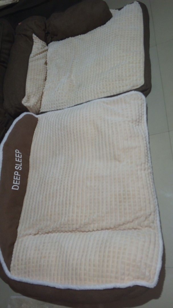 Deep Sleep brown and cream plush pet bed (Category: Homes & Other Pet Accessories) located in Manila. Submitted by emoteradot15103 (Listing ID 1467472377, Image 3). Description: Cozy brown and cream pet bed for dogs and cats! Features a soft waffle-textured sleeping surface, plush fleece lining, and supportive bolster walls with a 'DEEP SLEEP' print. Perfect for your fur baby's ultimate comfort. RETAIL GRADE quality, grab it now!.