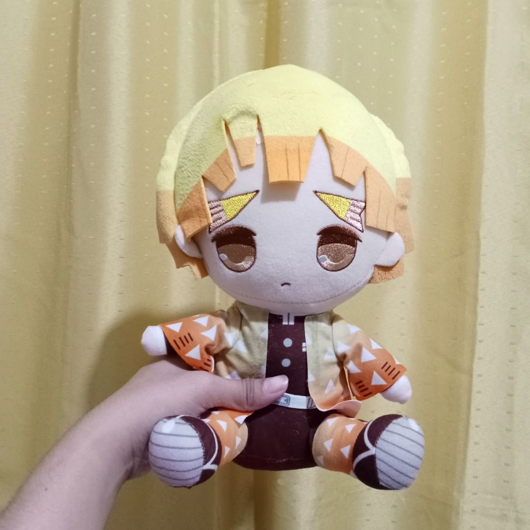 Demon Slayer Agatsuma Zenitsu Plush Doll (Category: Plushies & Soft Toys) located in Quezon City. Submitted by trinket_cat (Listing ID 1467384324, Image 1). Description: issue: glue residues may punit kaunti sa etiketa .