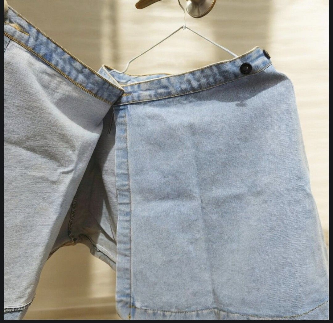 denim skirt wrap-around Light wash (Category: Skirts) located in Taguig. Submitted by deyerreC2020 (Listing ID 1467472236, Image 2). Description: nice skirt hard denim preloved skirt Light wash denim skort featuring a trendy wrap-around front with double black buttons , in good condition no flaws length: 17 waist : 26-28 & can be readjusted up to waist 32 by resetting buttons Super easy to style with your favorite crop tops and tees for a cute we