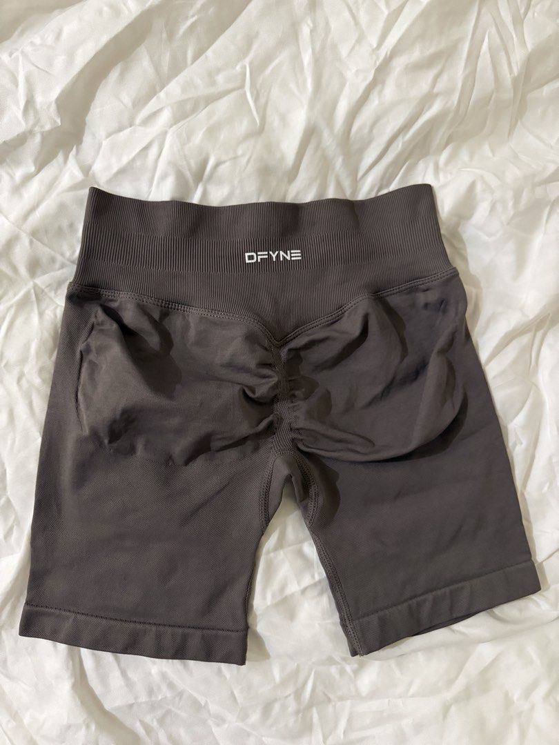 DFYNE Extra Small in Truffle (Category: Activewear) located in Makati City. Submitted by lvshop_mnl (Listing ID 1467400314, Image 2). Description: - Brand: DFYNE - Item: Workout Shorts - Size: Extra Small (XS) - Material: 90% Nylon, 10% Elastane (super stretchy and comfortable) - Design: Ribbed high waistband, scrunch bum detail, and white logo text on the back RFS: Too small for me.