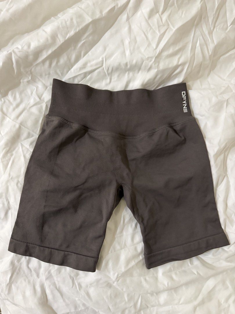 DFYNE Extra Small in Truffle (Category: Activewear) located in Makati City. Submitted by lvshop_mnl (Listing ID 1467400314, Image 1). Description: - Brand: DFYNE - Item: Workout Shorts - Size: Extra Small (XS) - Material: 90% Nylon, 10% Elastane (super stretchy and comfortable) - Design: Ribbed high waistband, scrunch bum detail, and white logo text on the back RFS: Too small for me.
