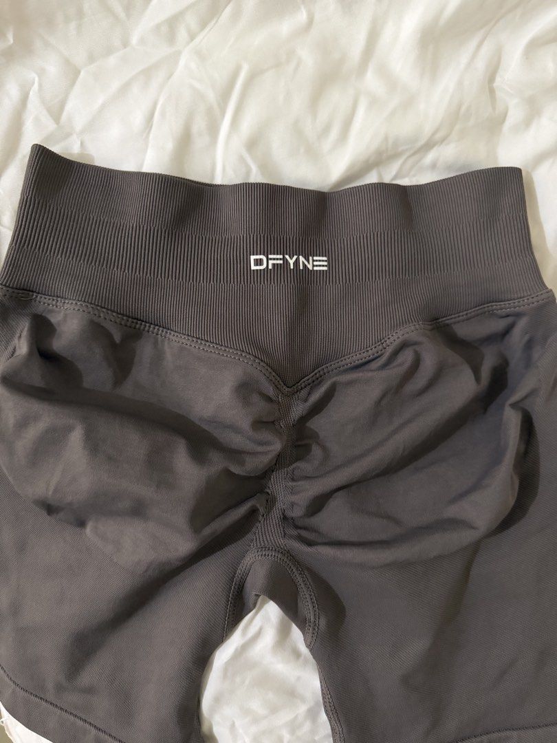 DFYNE Extra Small in Truffle (Category: Activewear) located in Makati City. Submitted by lvshop_mnl (Listing ID 1467400314, Image 3). Description: - Brand: DFYNE - Item: Workout Shorts - Size: Extra Small (XS) - Material: 90% Nylon, 10% Elastane (super stretchy and comfortable) - Design: Ribbed high waistband, scrunch bum detail, and white logo text on the back RFS: Too small for me.