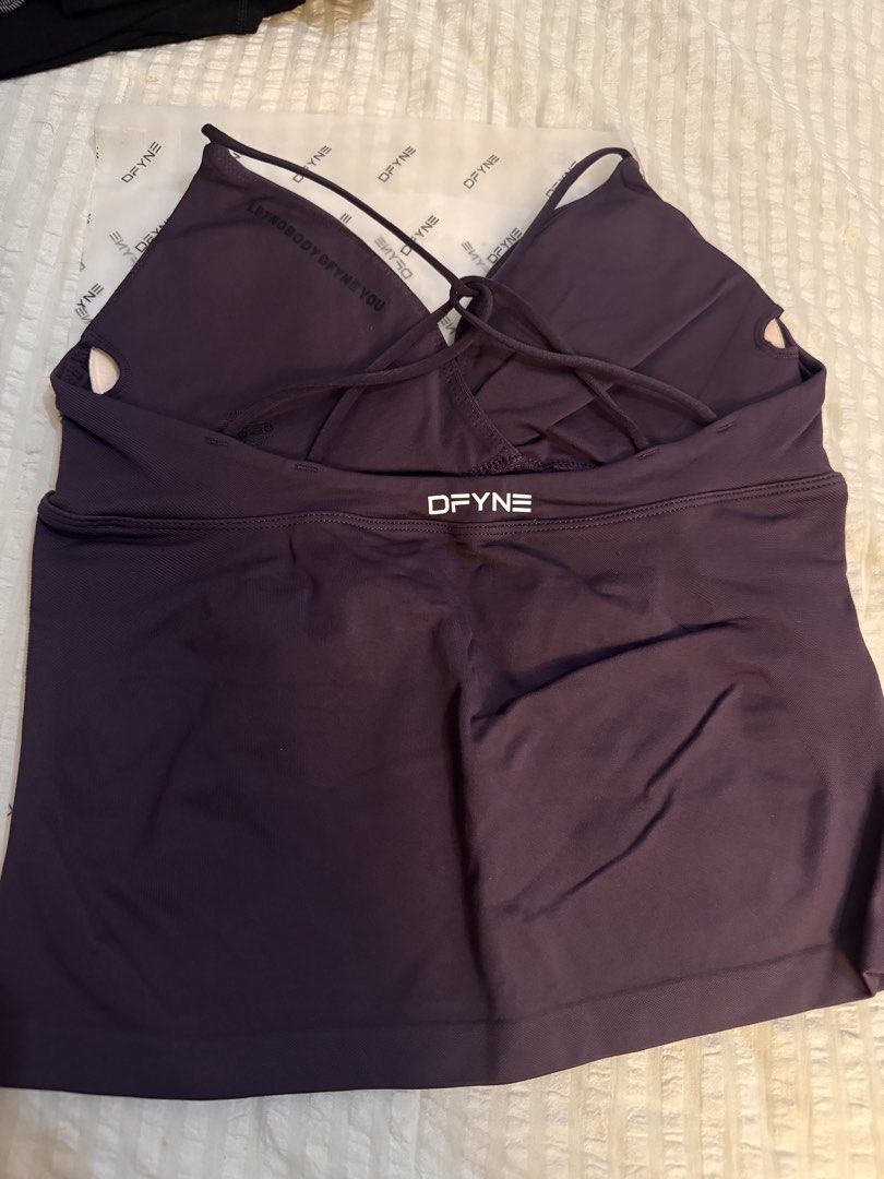 Dfyne Purple Plum Tank Top (Category: Activewear) located in Manila. Submitted by cgyu._ (Listing ID 1467449822, Image 2). Description: brand new never used size m but size is kinda small, compressive rather! so fits s best? :) .