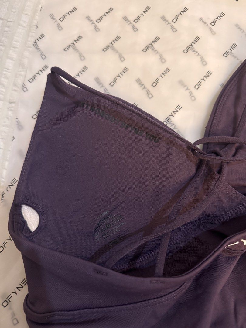 Dfyne Purple Plum Tank Top (Category: Activewear) located in Manila. Submitted by cgyu._ (Listing ID 1467449822, Image 3). Description: brand new never used size m but size is kinda small, compressive rather! so fits s best? :) .