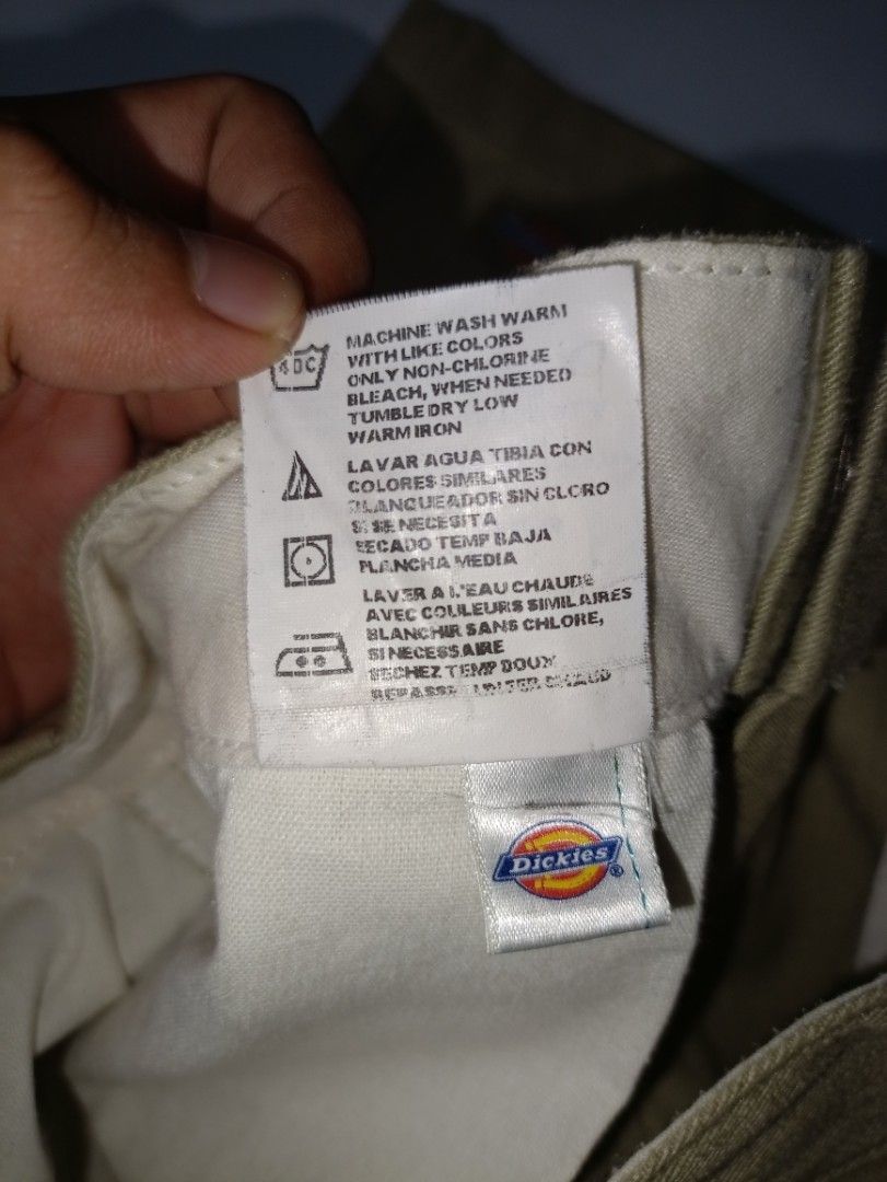 Dickies Khaki Cargo Shorts Size 30 (Category: Shorts) located in Caloocan City. Submitted by grandturtle-371b8d (Listing ID 1467397692, Image 2). Description: - Brand: Dickies - Item: Men's Khaki Shorts - Size: 30 - Material: Sturdy cotton-poly blend (machine washable) - Features: Classic workwear style, signature logo patch on side pocket, back welt pockets, button waist, and zip fly - Condition: Great everyday wear with minor tiny spots visible