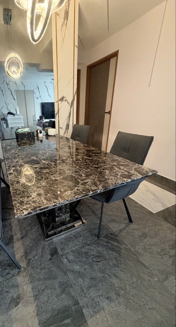 Dining Table (Solid Marble) (Category: Tables & Sets) located in Singapore. Submitted by ihr_kleines_reich (Listing ID 1467444431, Image 3). Description: Well-used solid marble dining table in good, like-new condition with no visible wear and tear. Everything is in good working order. Selling the table only, as the chairs are worn out. Ready to be collected end of November 2026..