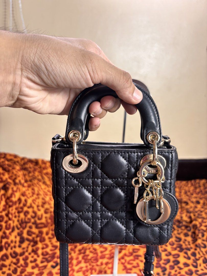 Dior Lady Dior Micro Lambskin satchel bag (Category: Cross-body Bags) located in Manila. Submitted by earlylifecrisis (Listing ID 1467378772, Image 3). Description: Condition 9/10 Measure it by inch Width: 5 Length: 4.5 Depth: 2.5 Handle:3 Sling: 16 •Refund / Returns not allowed allowed •Please do check the dimensions size on labels sometimes are not accurate on the sizing •Ask me before purchasing.