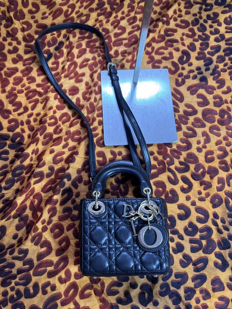 Dior Lady Dior Micro Lambskin satchel bag (Category: Cross-body Bags) located in Manila. Submitted by earlylifecrisis (Listing ID 1467378772, Image 2). Description: Condition 9/10 Measure it by inch Width: 5 Length: 4.5 Depth: 2.5 Handle:3 Sling: 16 •Refund / Returns not allowed allowed •Please do check the dimensions size on labels sometimes are not accurate on the sizing •Ask me before purchasing.