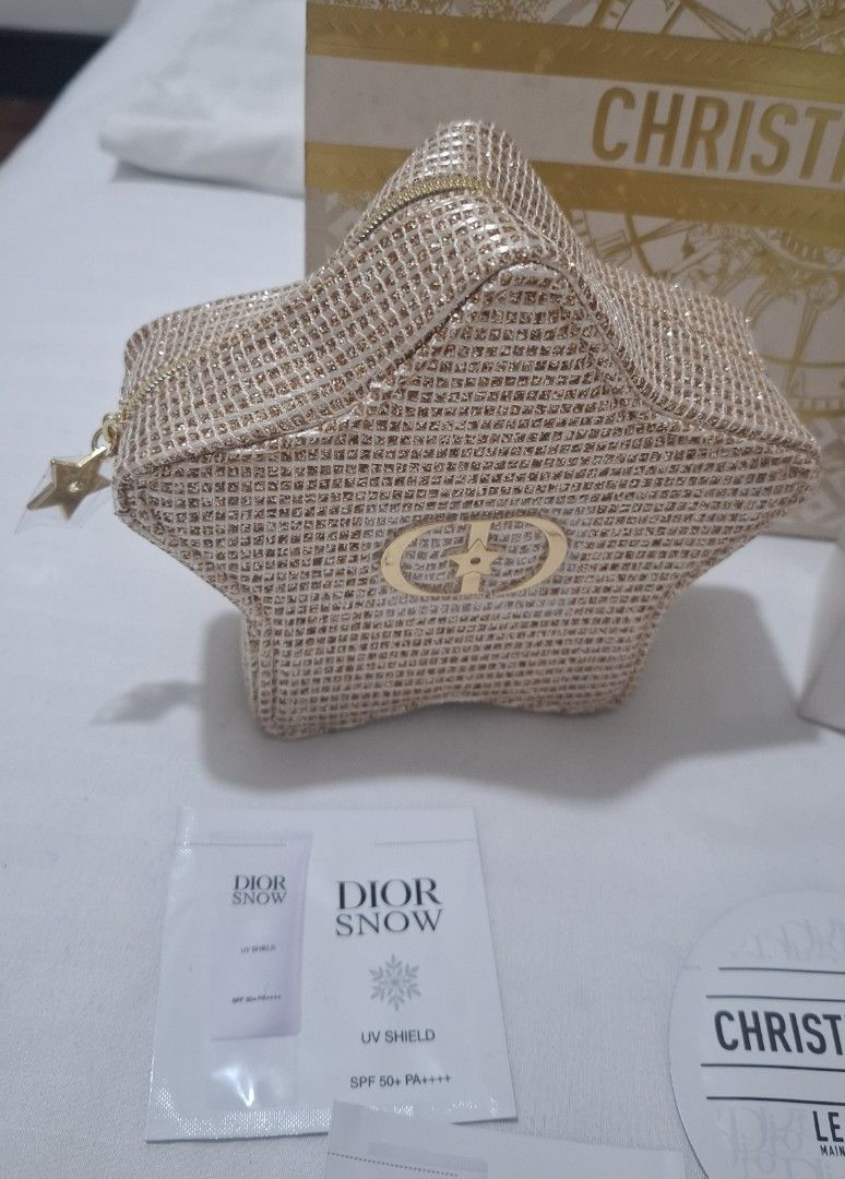 Dior pouch and face and hand care (Category: Face Care) located in Taguig. Submitted by welcome2myprelovedshop (Listing ID 1467470161, Image 2). Description: take this luxury set for only 1k with free sachet hand cream spf cream face serum golden start pouch with box and ribbon paperbag last price posted. some are selling the pouch alone for 1k plus mine is set na so your getting a great deal 👍.