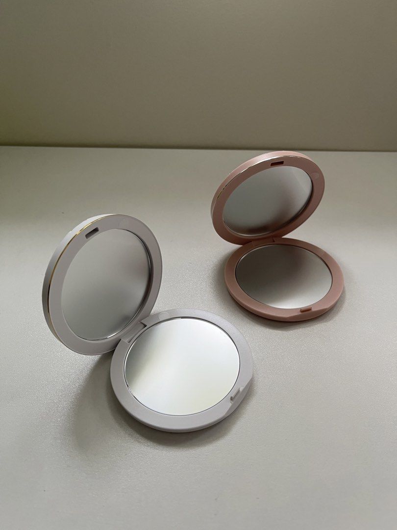 Dior Quilted Compact Mirror Pink White (Category: Makeup) located in Manila. Submitted by jangwg_ (Listing ID 1467377971, Image 2). Description: Round Compact Mirror with Quilted Leather Texture Colors Available: White and Pink Slim, pocket-sized, and travel-friendly.