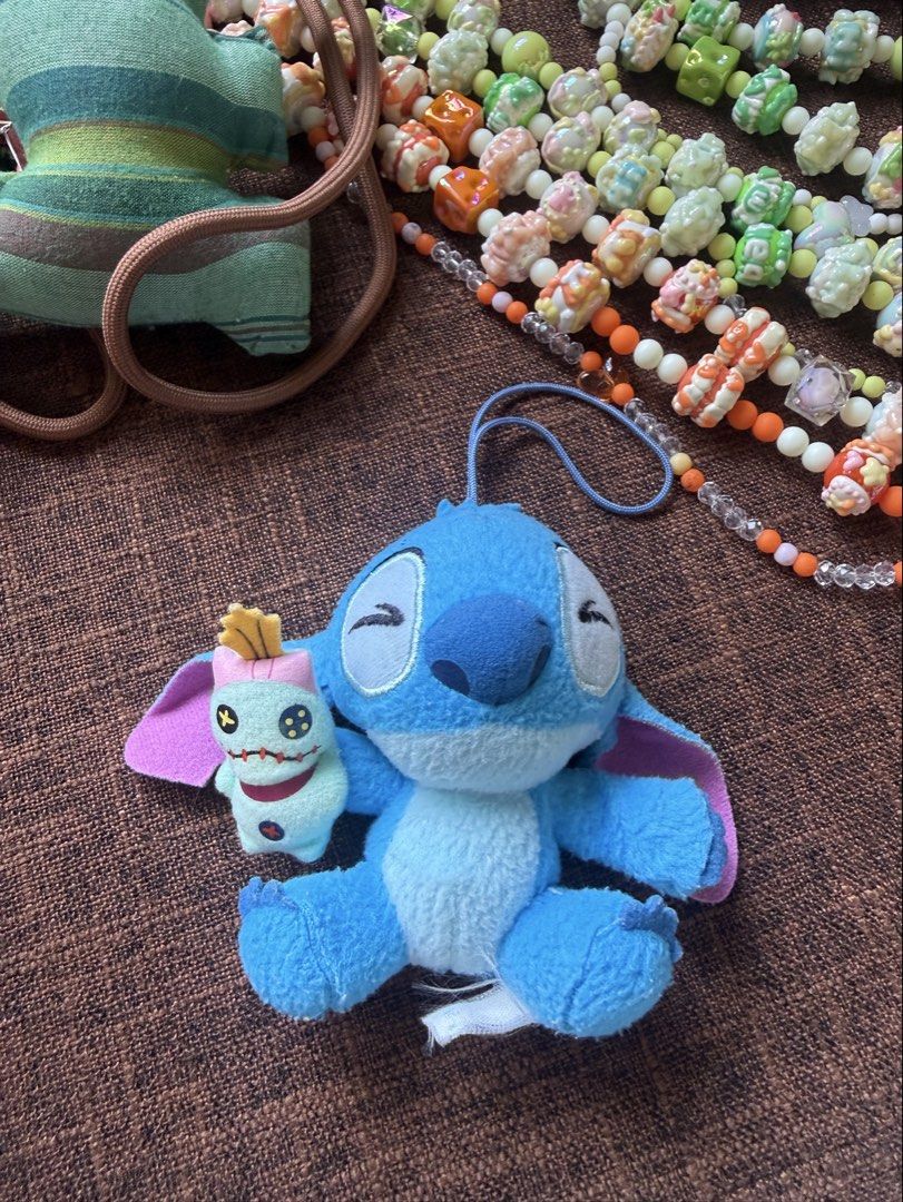 Disney Stitch and Scrump Plush Keychain. (Category: Plushies & Soft Toys) located in Bayombong. Submitted by nica7 (Listing ID 1467515747, Image 2). Description: Good condition no stain Key Details • Characters: Stitch (from Disney’s Lilo & Stitch) holding a small plush Scrump doll. • Type: Small stuffed plush keychain or bag charm with a blue cord loop..