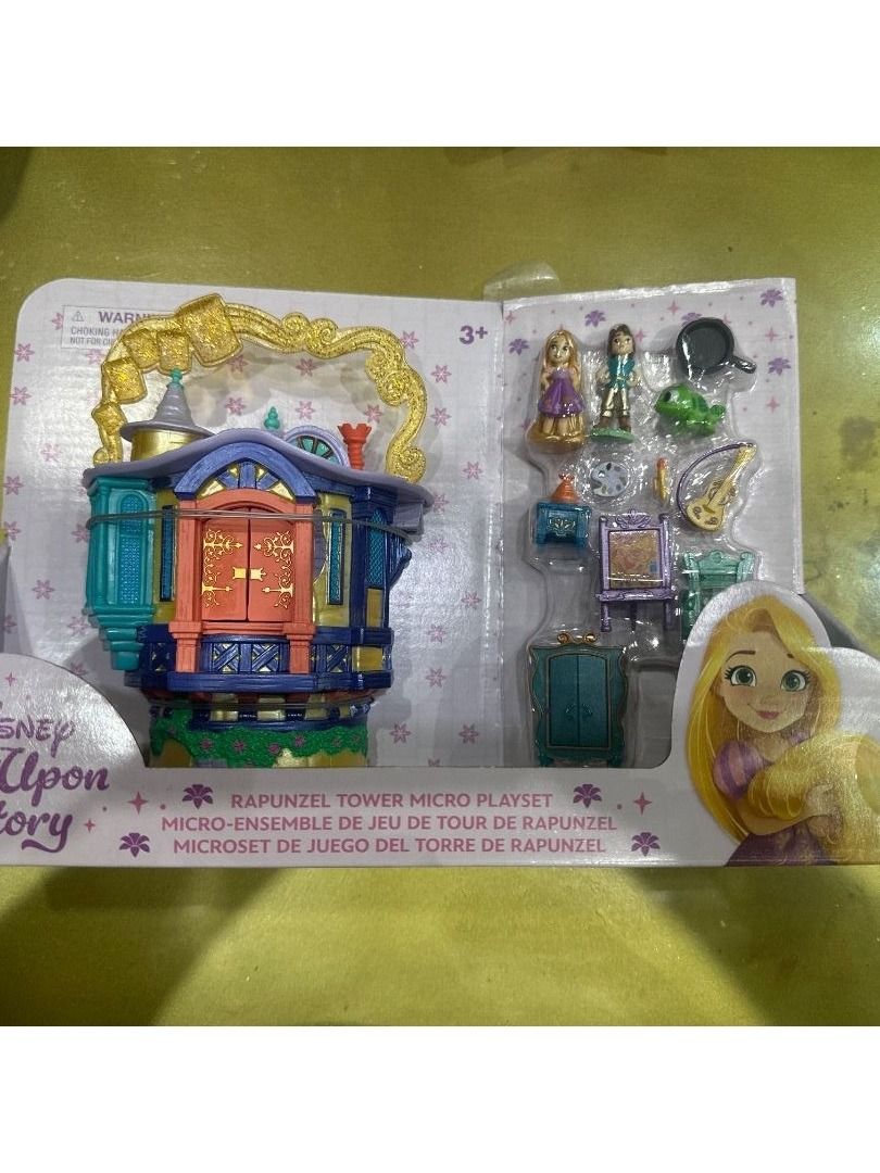 Disney Tangled Rapunzel's Tower Playset (Category: Kids Toys) located in Mandaluyong City. Submitted by bookhaven.bookhaven (Listing ID 1431508964, Image 2). Description: - Rapunzel's Tower playset with handle. - Includes Rapunzel and Flynn Rider figures. - Features detailed interior with accessories. - Colorful tower design with door and windows. - Perfect for Tangled movie lovers! The bare necessities Ages 3+ ABS plastic / PVC Tower (closed): a