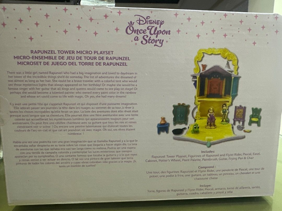 Disney Tangled Rapunzel's Tower Playset (Category: Kids Toys) located in Mandaluyong City. Submitted by bookhaven.bookhaven (Listing ID 1431508964, Image 3). Description: - Rapunzel's Tower playset with handle. - Includes Rapunzel and Flynn Rider figures. - Features detailed interior with accessories. - Colorful tower design with door and windows. - Perfect for Tangled movie lovers! The bare necessities Ages 3+ ABS plastic / PVC Tower (closed): a