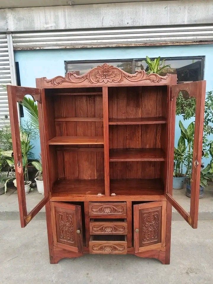 Display cabinet narra wood (Category: Shelves, Cabinets & Racks) located in Manila. Submitted by carmelites36250 (Listing ID 1467483286, Image 2). Description: Kitchen Cabinet made of solid Narra Wood. Restored and revarnished. Ready to use. Clear glass will be installed prior to delivery. Get it for only P16,450. Size L48 x W19 x H76 inches.