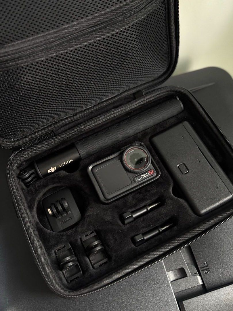 DJI Osmo Action 5 Pro Adventure Combo + Mic Mini (Category: Video Cameras) located in Manila. Submitted by heysugarstitch (Listing ID 1467541573, Image 2). Description: BARELY USED! WITH STORE RECEIPT AND UNDER WARRANTY - DJI Osmo Action 5 Pro Adventure Combo with original box - Includes 3 batteries, battery case, extension rod, protective frame, and mounting accessories - DJI Mic Mini wireless microphone set included (with original box) - Everyt