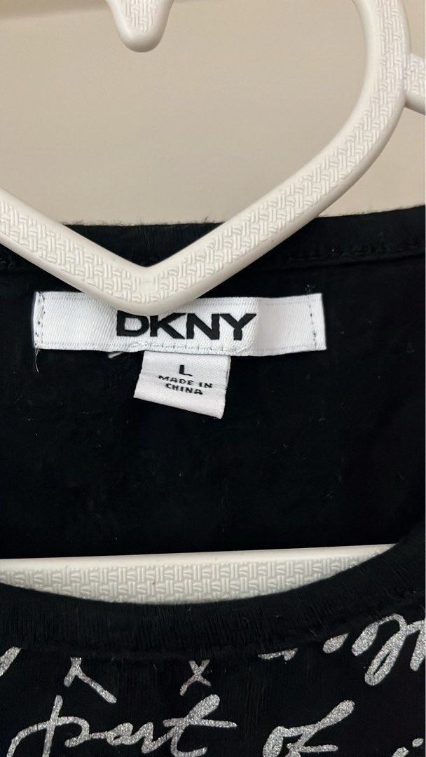 DKNY T-shirt (Category: Shirts) located in Dagupan City. Submitted by joyous.finds (Listing ID 1467389328, Image 2). Description: size to medium but large on tag.