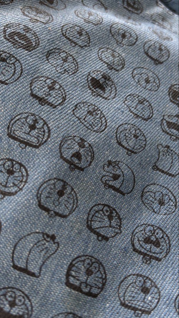 Doraemon Denim Sling bag (Category: Character Goods) located in Calamba. Submitted by cur8d (Listing ID 1467406263, Image 3). Description: 8.5 x 10 inches no zipper.