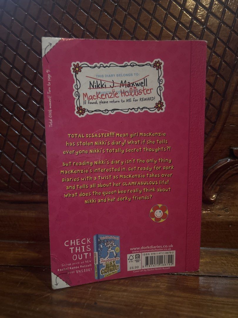 Dork Diaries Drama Queen Secondhand Book (Category: Children's Books) located in Manila. Submitted by declutter.diaries (Listing ID 1467388485, Image 3). Description: - Dork Diaries Book Drama Queen by Rachel Renee Russell - Edition: Paperback with a trendy leopard print cover - Condition: Pre-owned with normal shelf wear on edges and corners, has name writing on first page - Pages: Completely intact and easy to read - Secondhand/preloved book so