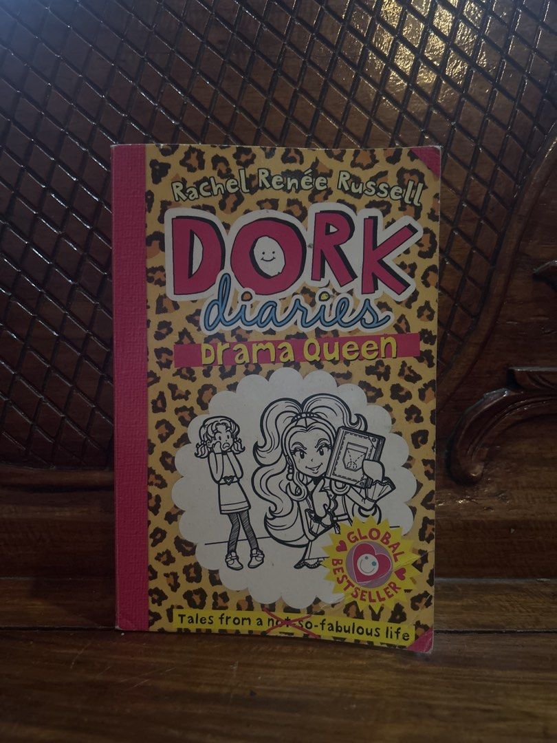 Dork Diaries Drama Queen Secondhand Book (Category: Children's Books) located in Manila. Submitted by declutter.diaries (Listing ID 1467388485, Image 1). Description: - Dork Diaries Book Drama Queen by Rachel Renee Russell - Edition: Paperback with a trendy leopard print cover - Condition: Pre-owned with normal shelf wear on edges and corners, has name writing on first page - Pages: Completely intact and easy to read - Secondhand/preloved book so