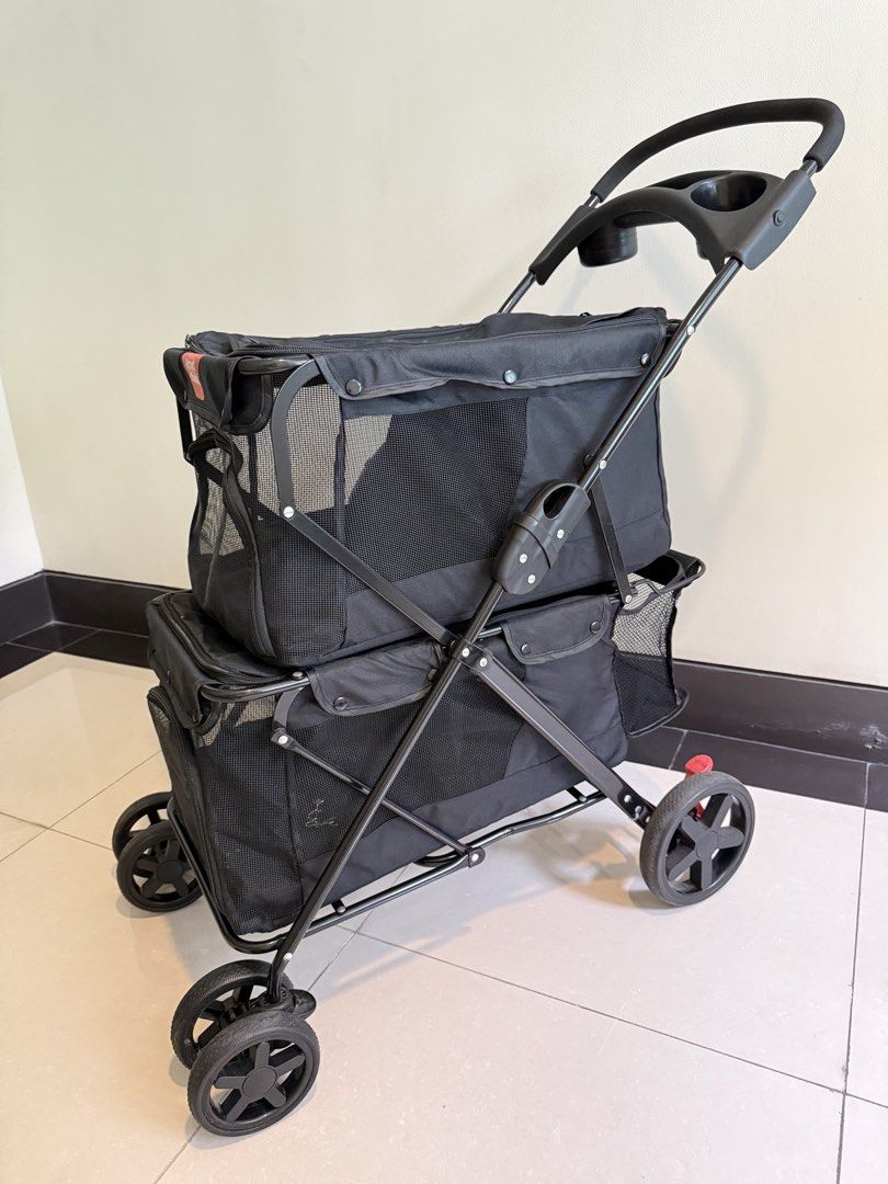 Double Deck Pet Stroller (Category: Homes & Other Pet Accessories) located in Manila. Submitted by trinketsofhappiness (Listing ID 1467432869, Image 1). Description: Double Deck Pet Stroller My furbabies are not really using this stroller so I’d rather have another furbaby to use it for good. It is freshly cleaned, sanitized and ready to use. Features: 360 universal wheels Easy to fold function Integrated cup holders Anti slip buckles on both dec