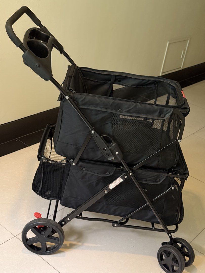 Double Deck Pet Stroller (Category: Homes & Other Pet Accessories) located in Manila. Submitted by trinketsofhappiness (Listing ID 1467432869, Image 2). Description: Double Deck Pet Stroller My furbabies are not really using this stroller so I’d rather have another furbaby to use it for good. It is freshly cleaned, sanitized and ready to use. Features: 360 universal wheels Easy to fold function Integrated cup holders Anti slip buckles on both dec
