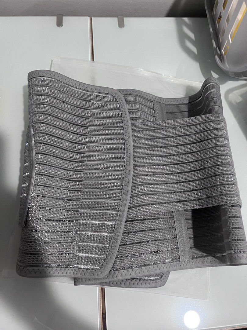 Dr. Spock Womens Postpartum Belly Binder (Category: Undergarments & Loungewear) located in Manila. Submitted by offthelabelmnl (Listing ID 1467472041, Image 1). Description: Dr. Spock Womens Postpartum Belly Binder - Color/Material: Grey breathable mesh fabric - Features: Adjustable dual straps for enhanced support and shaping - Design: Lightweight and comfortable - Condition: Brand new, never used, in original packaging RFS: did not undergo CS L