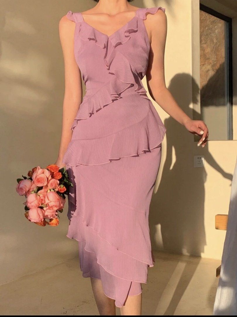 Dusty pink ruffle midi dress (Category: Dresses) located in Manila. Submitted by preloveditems_jem (Listing ID 1467523466, Image 2). Description: Dusty pink midi dress with layered ruffles and a flattering V-neck. Worn only once in a wedding. Light, flowy, and hits at mid-calf. Perfect for special occasions!.