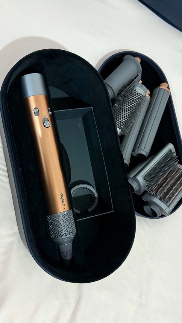 Dyson Airwrap Multi-Styler Complete (Category: Hair) located in Caloocan City. Submitted by reizbuenaventura (Listing ID 1467599801, Image 3). Description: - Model: Dyson Airwrap - Colorway: Ceramic Pop and Copper - Condition: Excellent working condition, fully tested and powers up normally - Cleanliness: Filters and all attachments are thoroughly cleaned - Storage: Always stored securely in its original presentation case - Inclusions: Original p