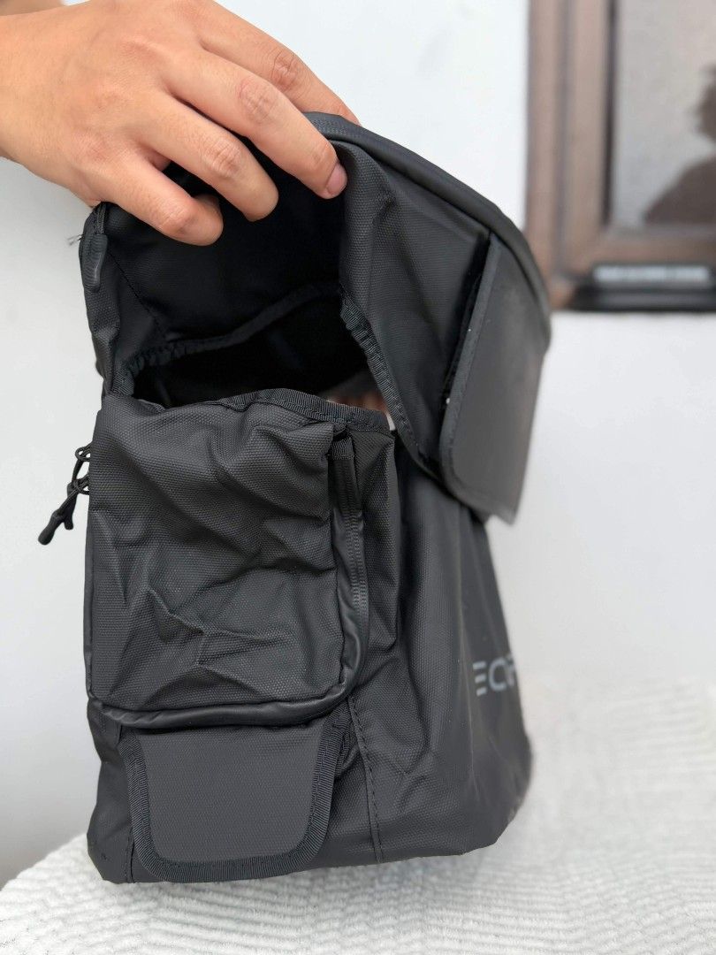 EcoFlow Storage Bag (Category: Cross-body Bags) located in Manila. Submitted by rusnoyell42981 (Listing ID 1467448712, Image 1). Description: - Authentic EcoFlow storage bag in sleek dark grey and clean condition - Built with tough, durable fabric and water-resistant zippers for maximum protection - Designed with practical side compartments and a clear ID window pocket - Open main top compartment for easy access to your items - Ideal for organizi