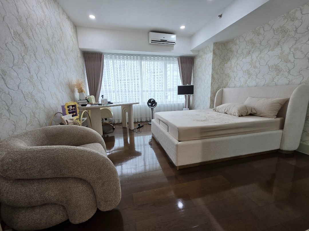 Edades Tower Rockwell Studio for Rent (Category: Apartments & Condos) located in Quezon City. Submitted by wkendfinds (Listing ID 1467446626, Image 1). Description: - Fully furnished studio unit, ready for immediate move-in - Sleeping & Living: Queen-size bed, plush armchair, study desk, and vanity mirror table - Kitchen: Built-in cabinets, sink, and stacked washer-dryer in a dedicated laundry closet - Bathroom: Glass shower enclosure with a luxu