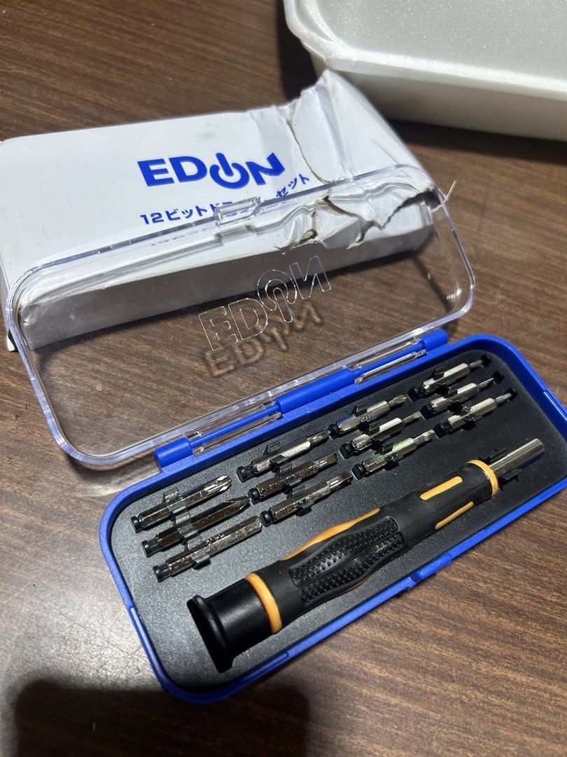 EDON 12-Bit Screwdriver Set with Case (Category: Construction Tools & Equipment) located in Manila. Submitted by starbalesukandjapansurplus (Listing ID 1467560311, Image 1). Description: - EDON 12-bit precision screwdriver set ideal for small electronics and tiny screws - Includes a magnetic handle and assorted bits - Comes in a clean, clear plastic storage case with blue trim - Original cardboard outer box has significant crushing and tears - To