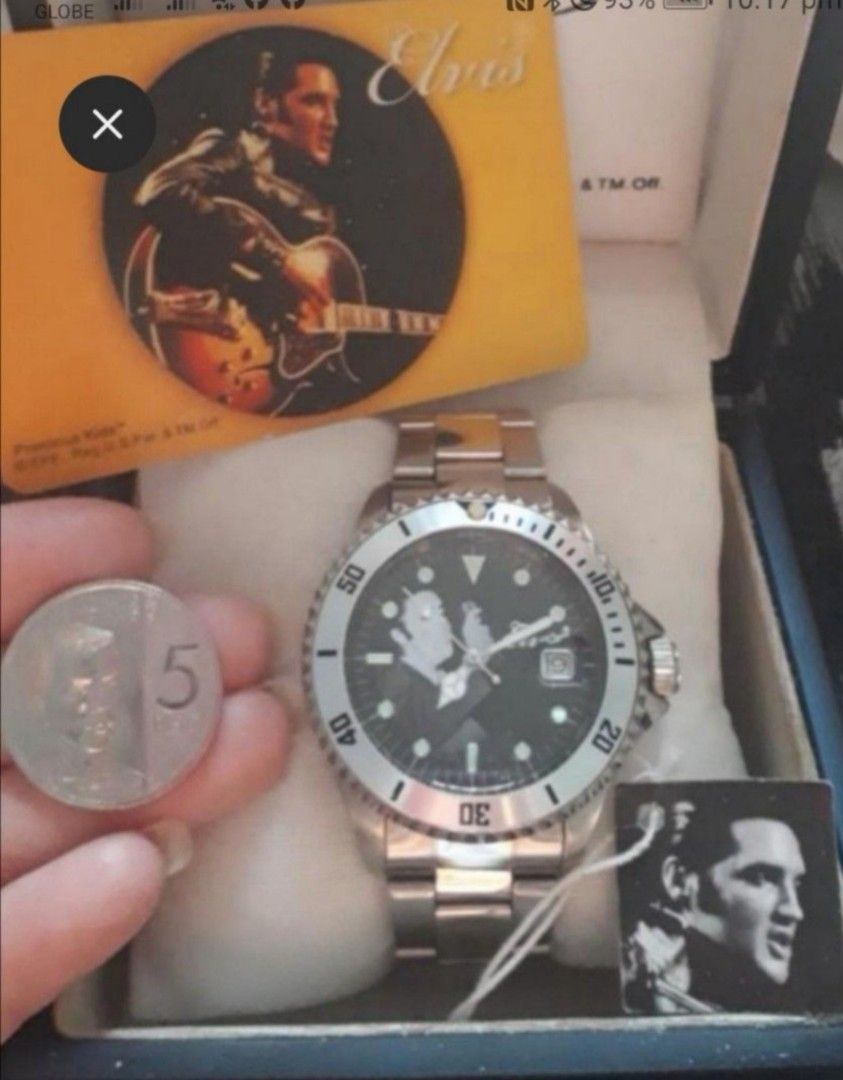 Elvis Presley Divers Watch (Category: Luxury Watches) located in Mandaluyong City. Submitted by ilovemyshop (Listing ID 1467399506, Image 2). Description: 💜 This is a vintage collectible Elvis Presley mechanical watch, purchased in Memphis USA. 💜 Doesn't need battery 💜 Comes with it's original box, tag and warranty card. 💜 Box lining has some discoloration due to storage. Kindly check photos..