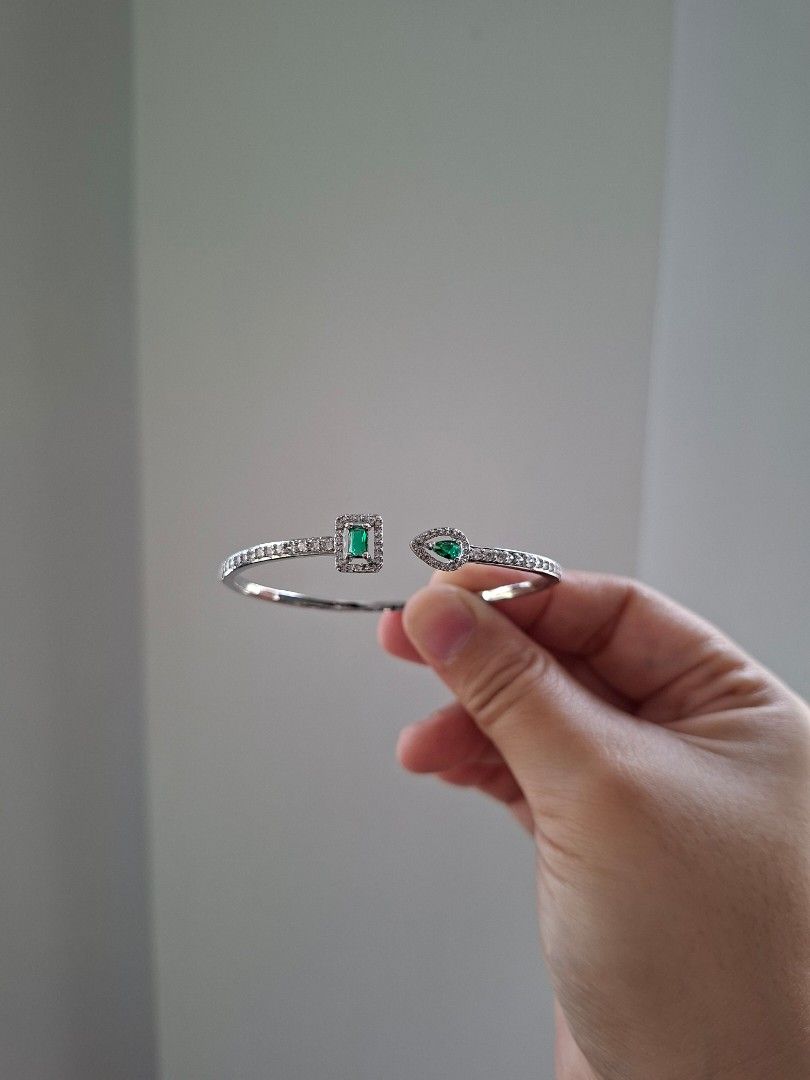 Emerald Srones and White Crystals Solid Stainless Steel Cuff Bangle Bracelet (Category: Bracelets) located in Dasmarinas. Submitted by danabrie22 (Listing ID 1467363372, Image 2). Description: very well-made, excellent crafstmanship 10/10 condition brand new stainless steel & colored cubic zirconia stones made in Hongkong.