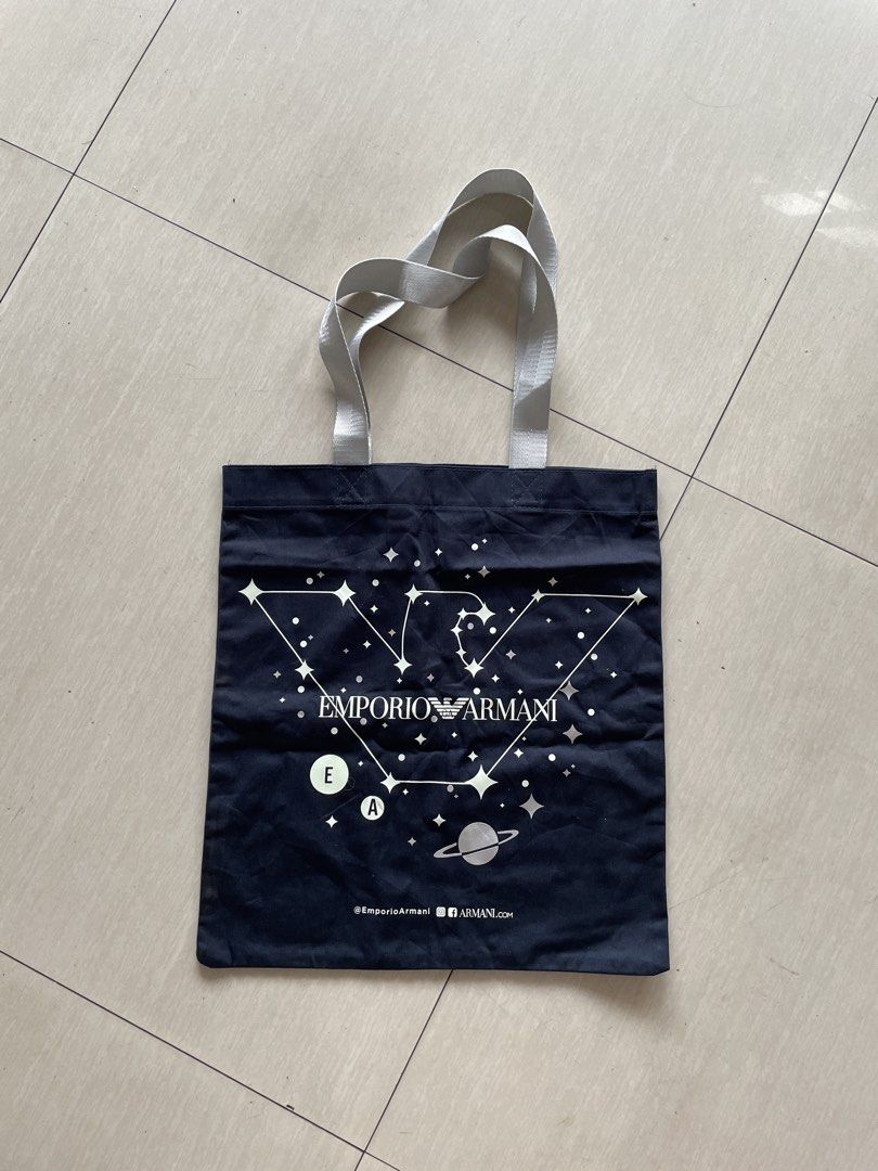 Emporio Armani Tote Bag (Category: Tote Bags) located in Lucena. Submitted by riyizthriftz (Listing ID 1467411606, Image 3). Description: Emporio Armani tote bag Glow in the Dark Good condition Color rate 9.5/10 .