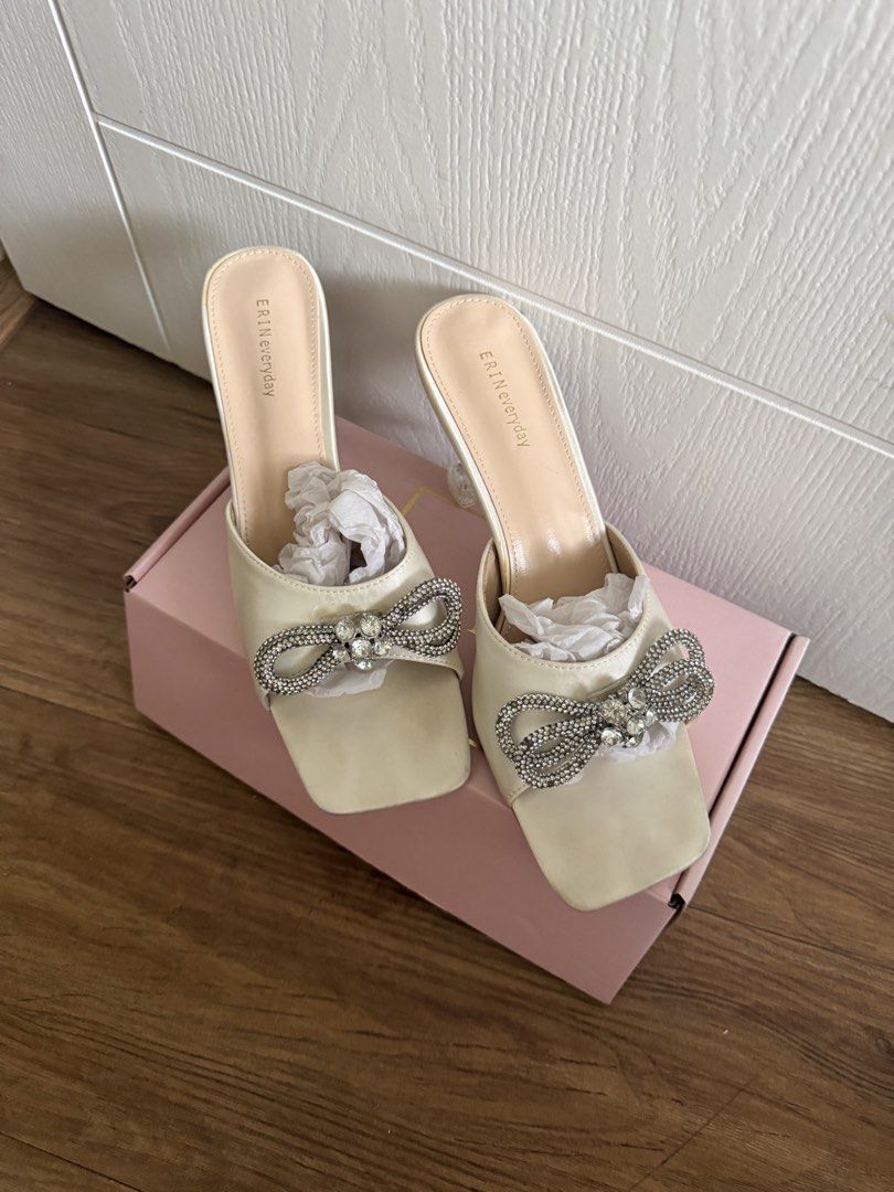 ERIN Cream Bow Mule Heels (Category: Heels) located in Paranaque City. Submitted by vjau_ (Listing ID 1467418341, Image 2). Description: - size 41 but fits size US 9 - used only once, kept in a box since - selling low! Last price posted .
