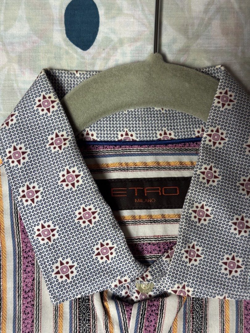Etro Milano Striped Long Sleeve Button-Down Shirt Size 40 (Category: Longsleeves) located in Manila. Submitted by seangoart (Listing ID 1467444608, Image 2). Description: - Brand: Etro Milano - Size: 40 (tag on interior collar) - Design: Multi-color vertical stripes with contrast geometric collar and cuffs (blue, white, and burgundy tones) - Details: Classic front button placket with branded buttons - Condition: Clean fabric with sharp prints - S