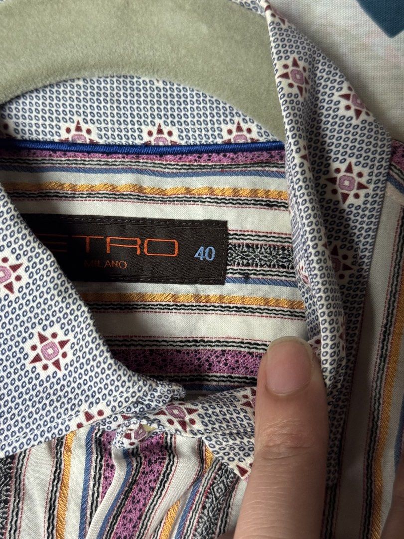 Etro Milano Striped Long Sleeve Button-Down Shirt Size 40 (Category: Longsleeves) located in Manila. Submitted by seangoart (Listing ID 1467444608, Image 3). Description: - Brand: Etro Milano - Size: 40 (tag on interior collar) - Design: Multi-color vertical stripes with contrast geometric collar and cuffs (blue, white, and burgundy tones) - Details: Classic front button placket with branded buttons - Condition: Clean fabric with sharp prints - S