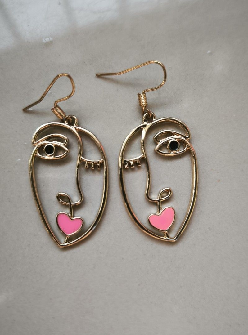 Face shape dangling earrings (Category: Earrings) located in Manila. Submitted by wearforce (Listing ID 1467514293, Image 1). Description: face shape dangling earrings brand new no issues 249 + sf.