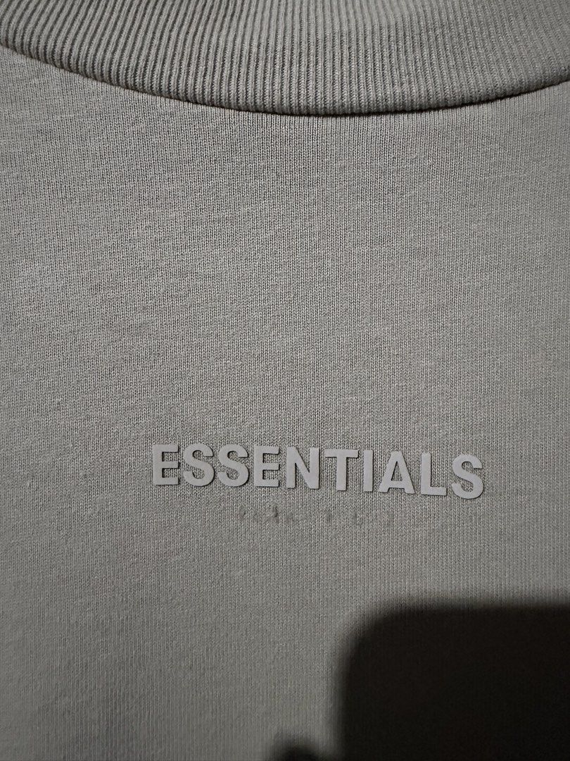 Fear of God Essentials Tee Core Header (Category: Tshirts & Polo Shirts ) located in Calasiao. Submitted by used_goodies222 (Listing ID 1467601448, Image 2). Description: 23*28 Authentic Single stitch Black Tag Rare piece.