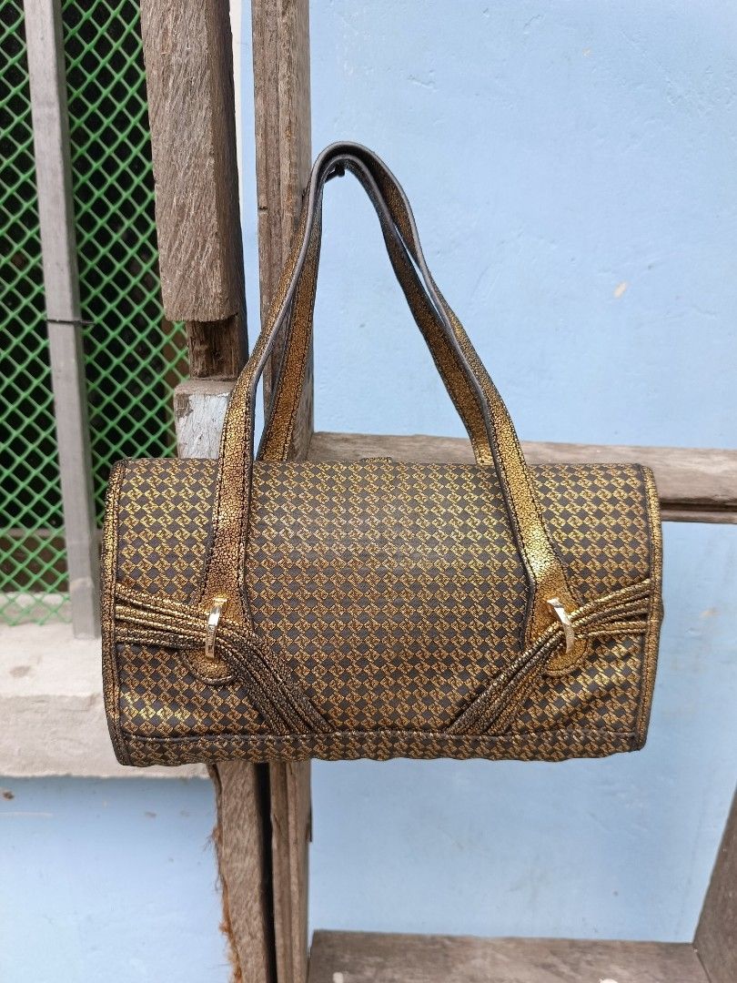 Fendi metallic gold patterned shoulder handbag (Category: Luxury Bags & Wallets) located in Manila. Submitted by alwaysgoodzthrift (Listing ID 1467416377, Image 2). Description: - Brand: Fendi - Color/Pattern: Dark brown fabric with a stunning metallic gold diamond pattern - Straps: Double straps in a unique crackled gold leather texture - Closure: Front flap with a secure metal clasp - Hardware/Accents: Includes a signature hanging metal Fendi l
