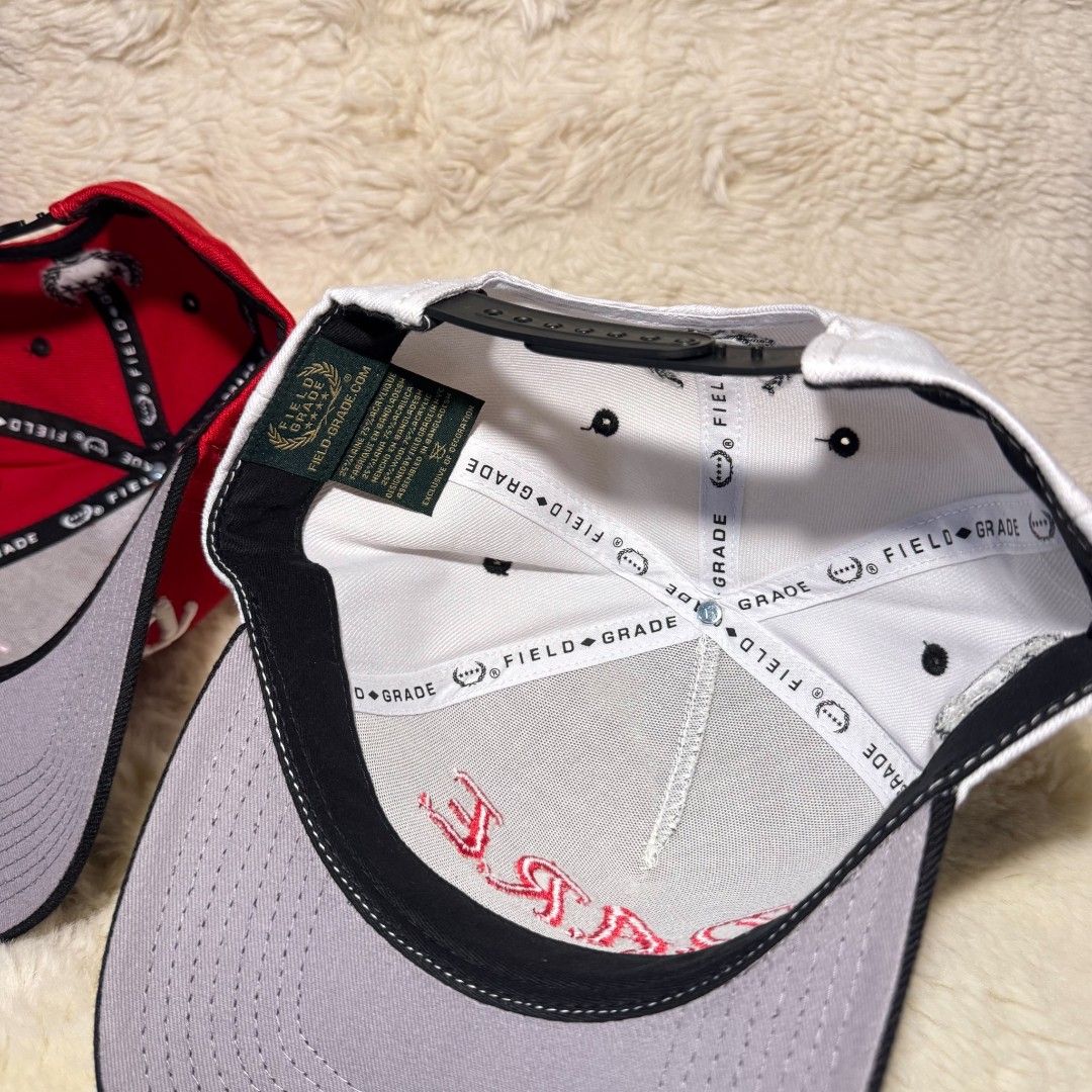 Field Grade D.A.R.E. Snapback Cap Collection (Category: Caps & Hats) located in Manila. Submitted by westcity.mnl (Listing ID 1467512019, Image 3). Description: - Brand: Field Grade - Design: D.A.R.E. embroidery on front, 'ME TO DO IT' under the brim, and ski mask graphic on the side - Fit: Adjustable snap closure - Details: Interior branding tags and taping included - Colors available: Black, Red, and White - Condition: Brand New.