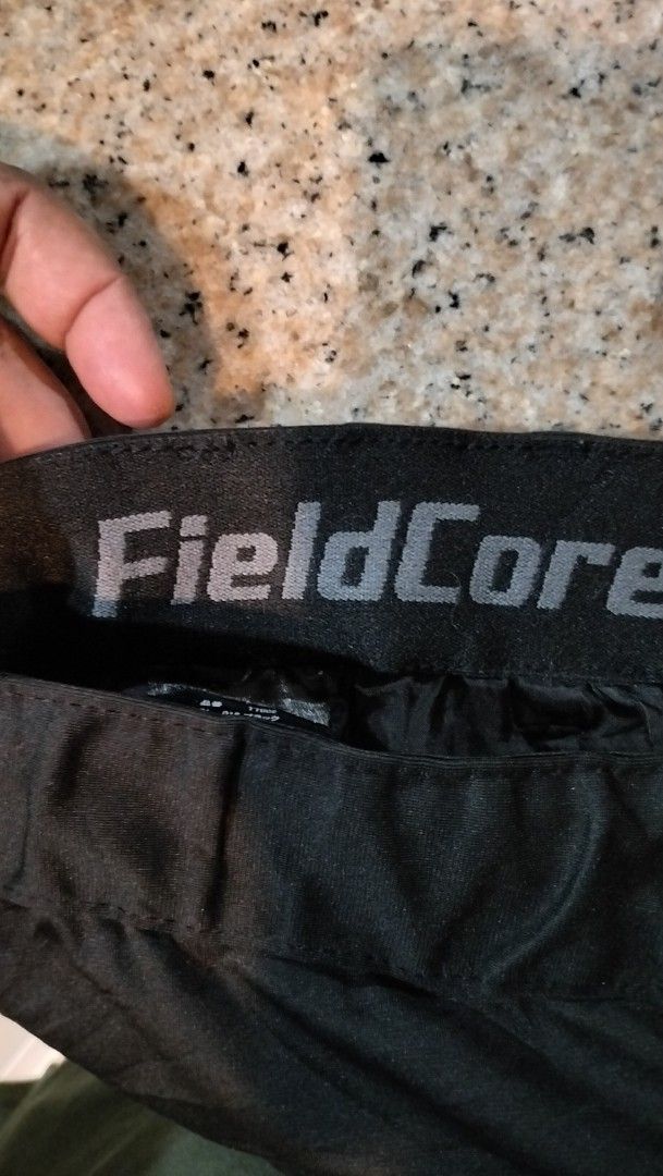 FieldCore Black Cargo Pants Size 3L (Category: Trousers) located in Angeles City. Submitted by mightywhale_13072f (Listing ID 1467411727, Image 3). Description: - Brand/Model: FieldCore Cargo Pants - Color: Black - Size: 3L (Waist: 91cm, Inseam: 78cm) - Material: 100% Polyester - Features: Multiple side utility pockets, elastic waistband with adjustable strap - Best for: Outdoor work or daily casual wear.