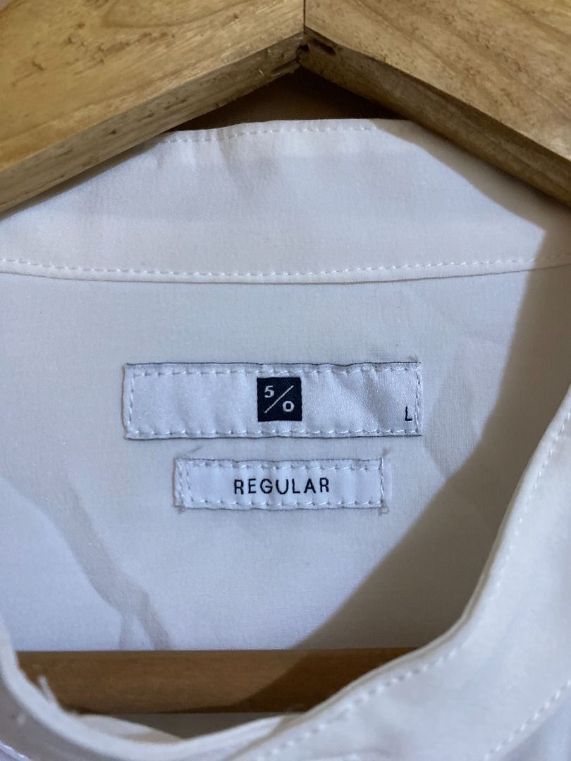 Fifty Percent Off White Stand Collar Button Long Sleeves (Category: Tshirts & Polo Shirts ) located in Cadiz. Submitted by thespotcdz (Listing ID 1467397288, Image 2). Description: Large on tag Width 22.5" Length 29-31" Good as new.