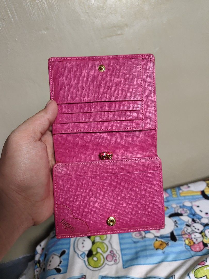 Fiorucci Hot Pink Leather Wallet (Category: Wallets & Card holders) located in General Mariano Alvarez. Submitted by findsandmoreph (Listing ID 1467368659, Image 1). Description: Authentic Vintage Fiorucci Italy Wallet (Fuchsia Pink) ✨ Price: ₱1500 (Slightly negotiable for serious buyers) Add a pop of retro-Y2K aesthetic to your style with this rare vintage find! This is a 100% original Fiorucci Italy wallet,It features a stunning fuchsia pink sa