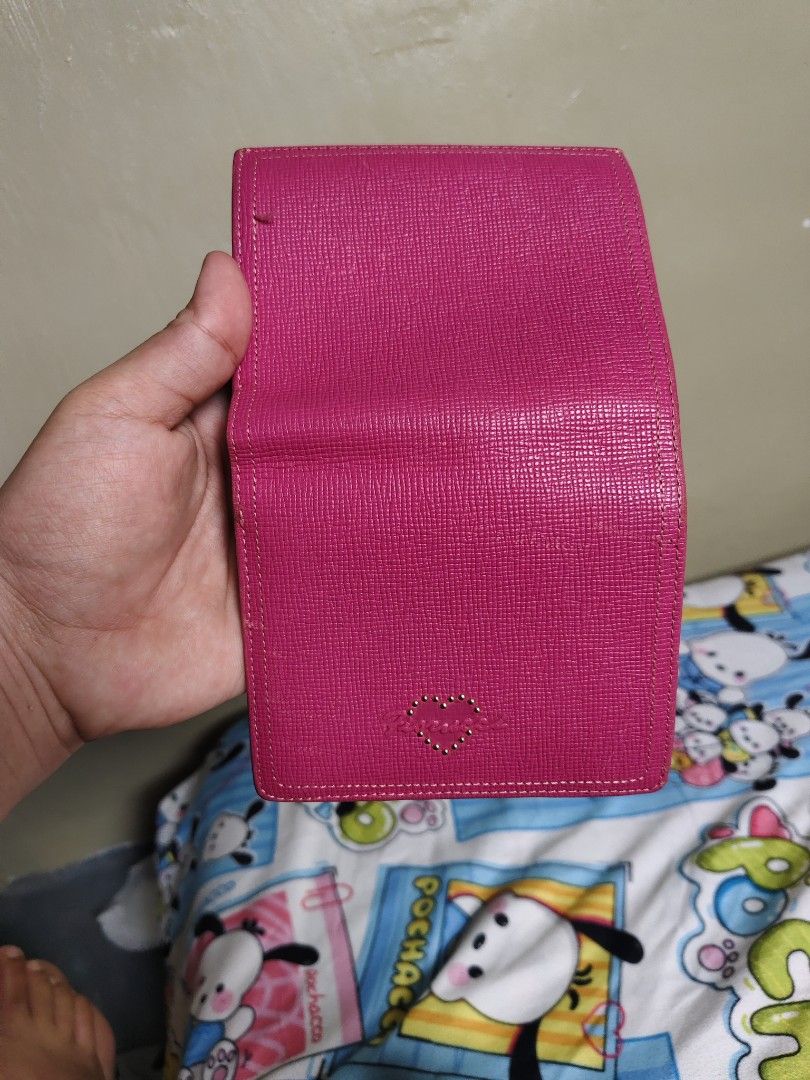 Fiorucci Hot Pink Leather Wallet (Category: Wallets & Card holders) located in General Mariano Alvarez. Submitted by findsandmoreph (Listing ID 1467368659, Image 2). Description: Authentic Vintage Fiorucci Italy Wallet (Fuchsia Pink) ✨ Price: ₱1500 (Slightly negotiable for serious buyers) Add a pop of retro-Y2K aesthetic to your style with this rare vintage find! This is a 100% original Fiorucci Italy wallet,It features a stunning fuchsia pink sa