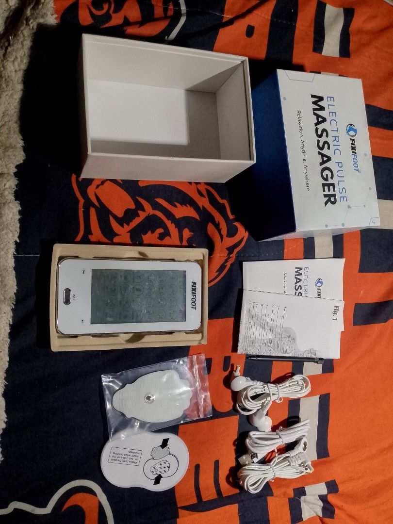 Fixifoot Electric Pulse Massager Device Set (Category: Massage Devices) located in Caloocan City. Submitted by gelo09990 (Listing ID 1467461128, Image 2). Description: - Brand new look & feel: Fixifoot Electric Pulse Massager Kit - Perfect for home muscle relaxation and recovery - Complete set: Digital controller unit, electrode pads, connection cables, USB charging cord, and manual - Comes in original box packaging - Customizable experience with