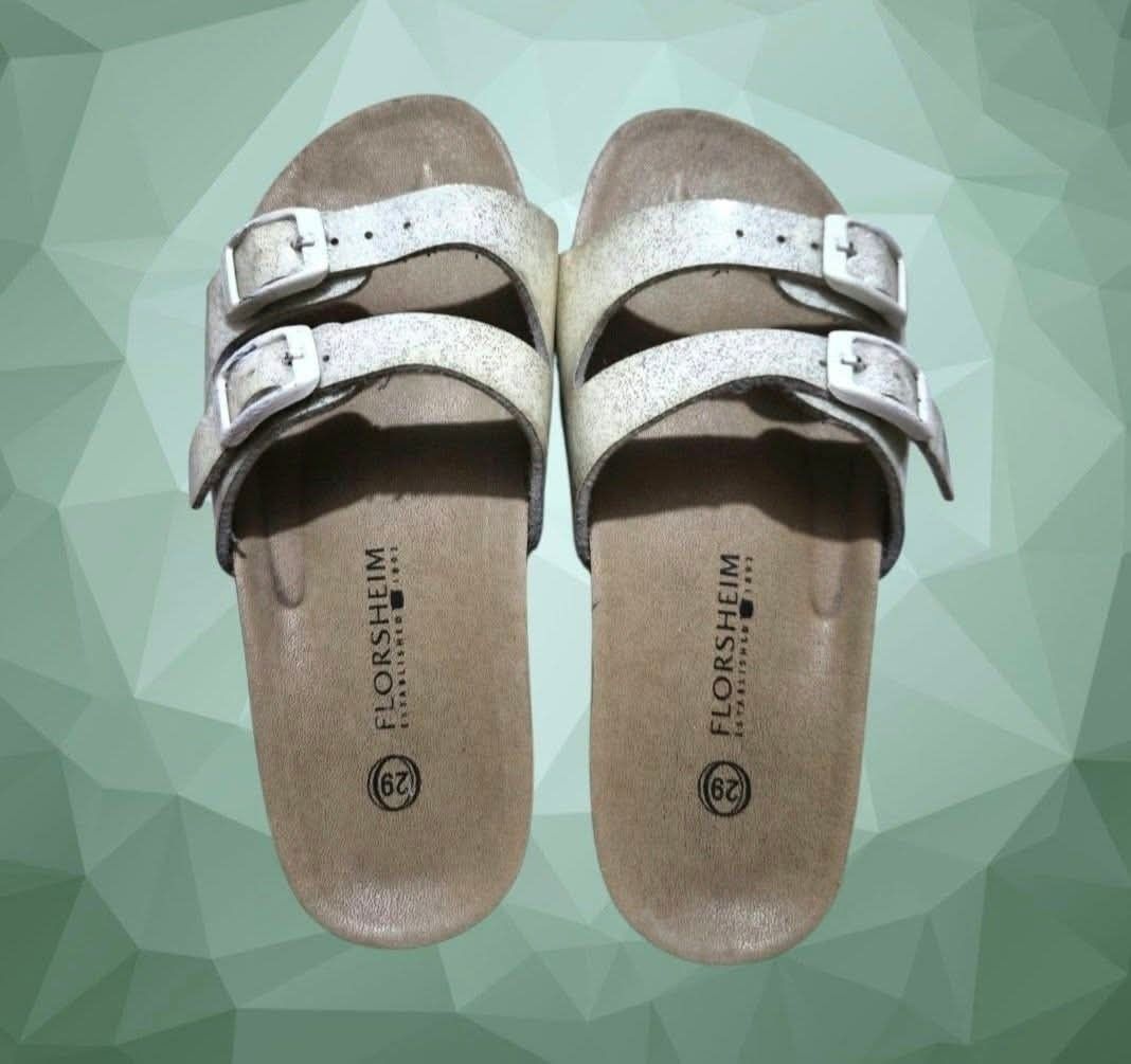 Florsheim slippers (Category: Slippers and slides) located in Paranaque City. Submitted by calm_youngstore7 (Listing ID 1467382541, Image 1). Description: Florsheim dual-strap cork-footbed slide sandals in a light textured finish with double buckle closures. Please see posted pictures for dimensions/size..
