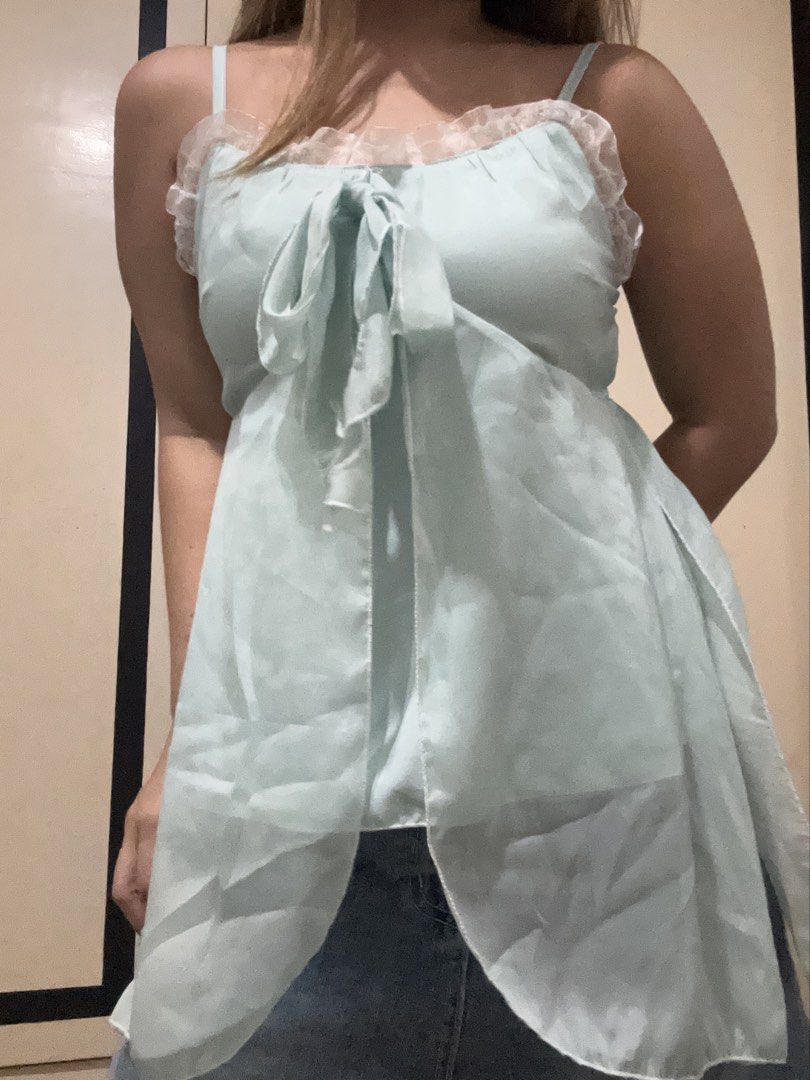 Flowy Light Blue/Teal Top (Category: Sleeveless) located in Cavite. Submitted by lj.collection (Listing ID 1467410591, Image 1). Description: ✦ Best fits s-m ✦ Got this on an ig shop for ₱370 ✦ Worn once ✦ No flaws! ✦ MOP: Gcash, Maya, Maribank, BDO ✦ MOD: J&T, Lalamove, Grab, Angkas.