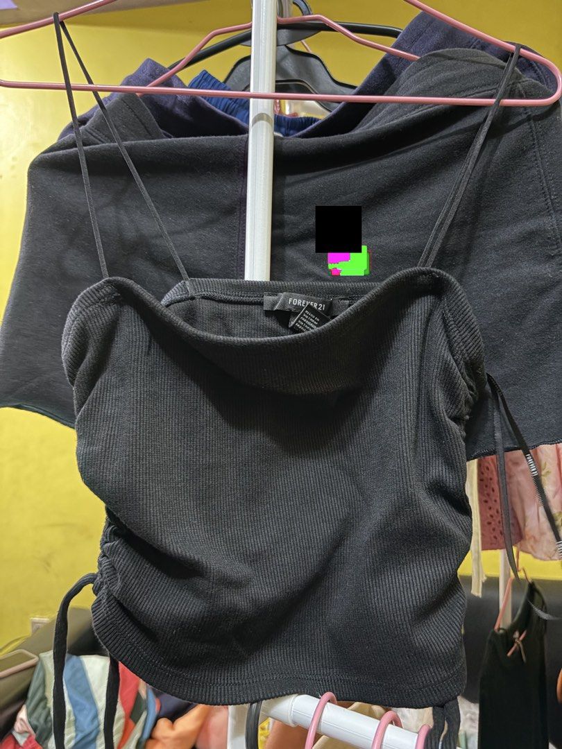 Forever 21 Black Ribbed Camisole (Category: Sleeveless) located in Calamba. Submitted by handpickedbynetty (Listing ID 1467385859, Image 1). Description: - Brand: Forever 21 - Size: S - Color: Black - Material/Style: Ribbed fabric with spaghetti straps and a flattering cowl neckline - Feature: Adjustable side drawstrings to customize the length - Origin: Made in Vietnam.
